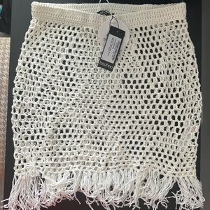 CROCHET TASSEL HEM BEACH MINI SKIRT